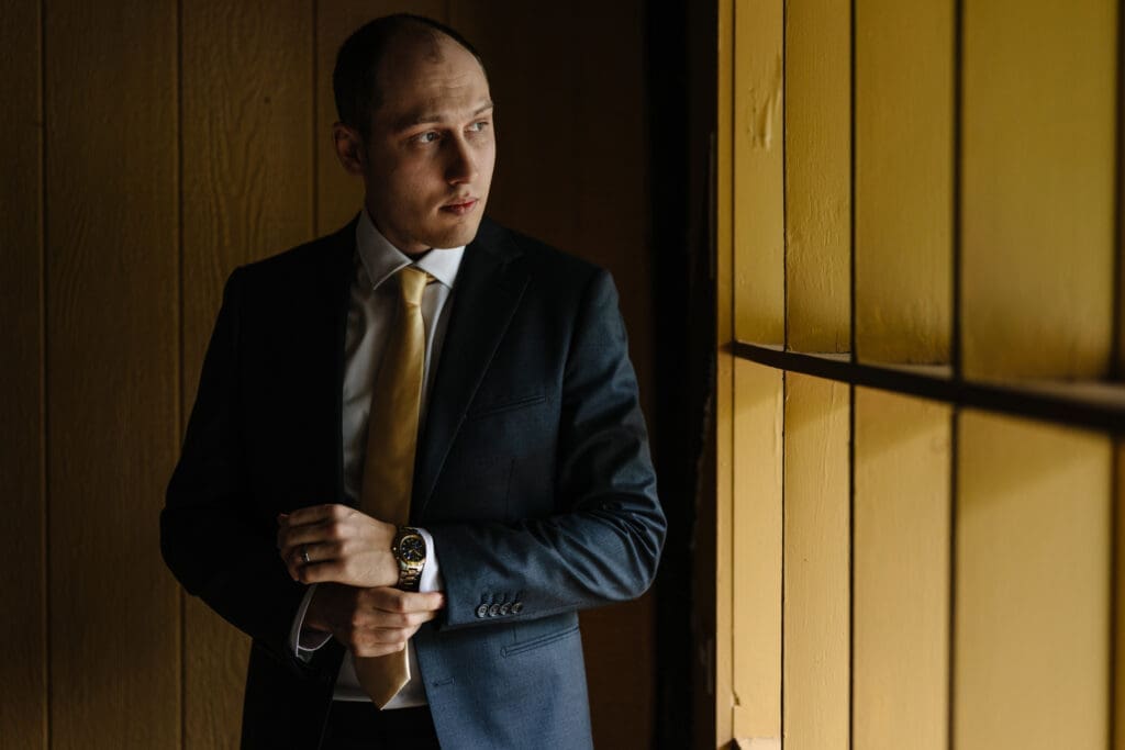 Groom getting ready for wedding in New Jersey.
