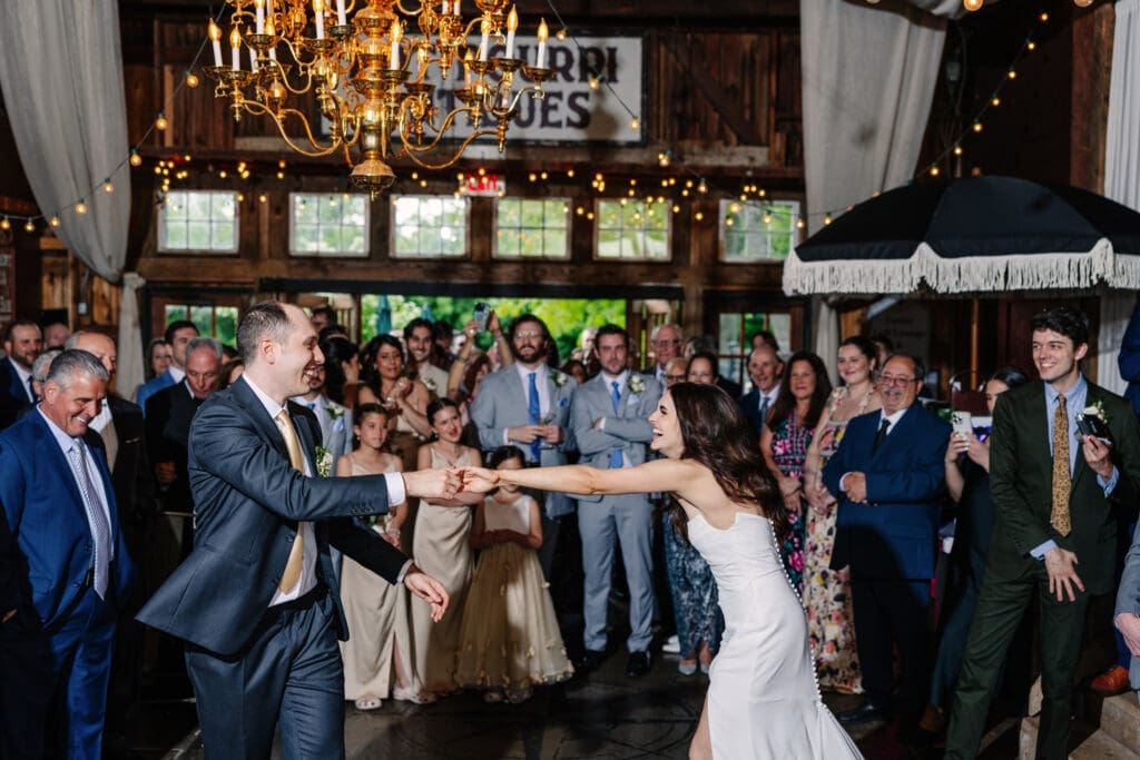Bride and Groom laughing during their first dance.