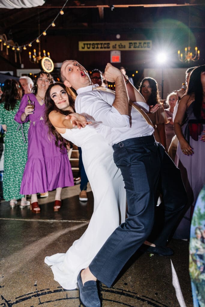 Bride and Groom being silly during wedding reception at Jack's Barn.