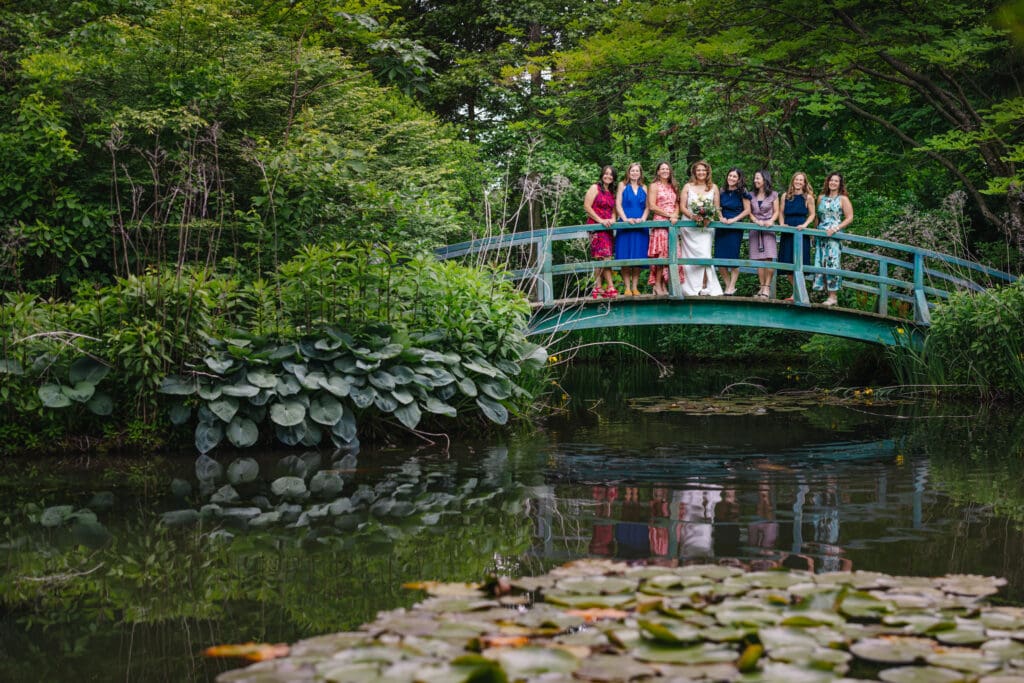 Wedding party portraits on the Monet-inspired bridge at Grounds For Sculpture in Hamilton Township, New Jersey.