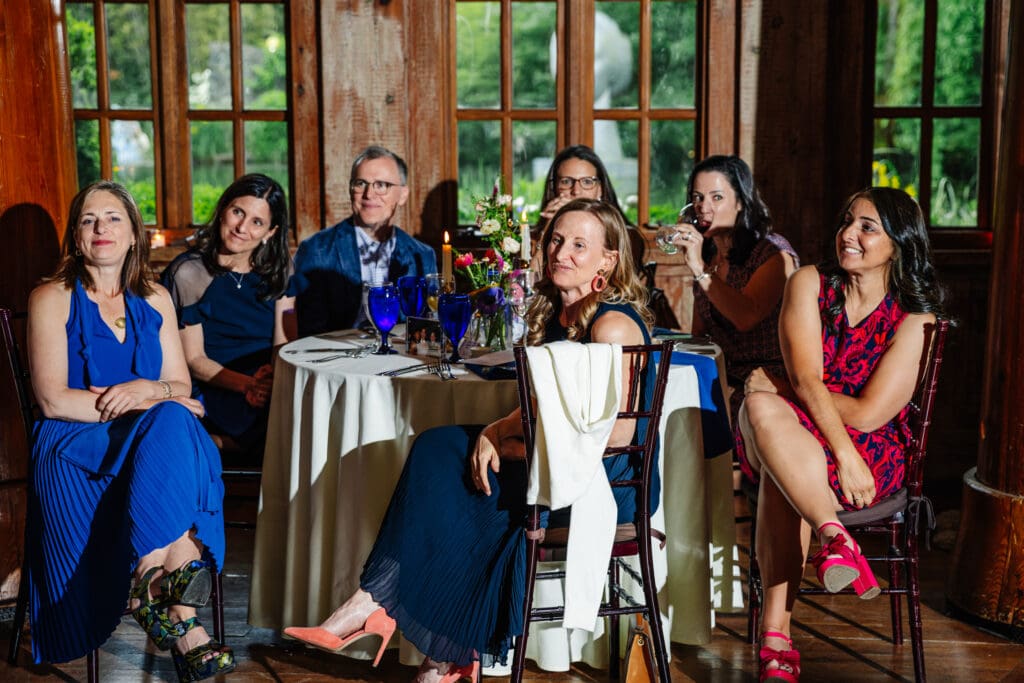Guests enjoying heartfelt and humorous speeches during a vow renewal reception in Hamilton Township, NJ.